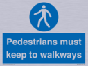 -pedestrians-must-keep-to-walkways-sign~